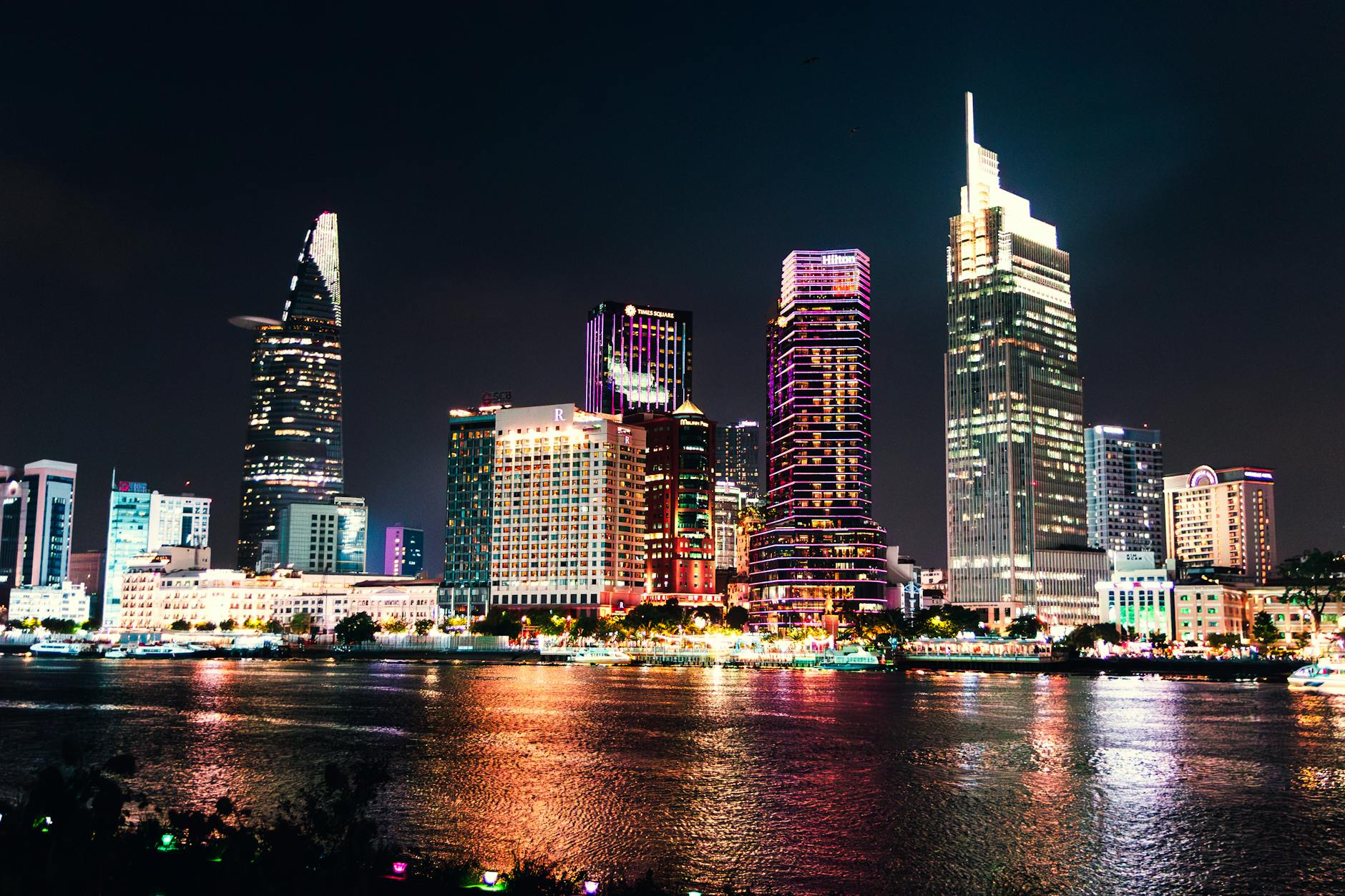 vibrant night skyline of ho chi minh city