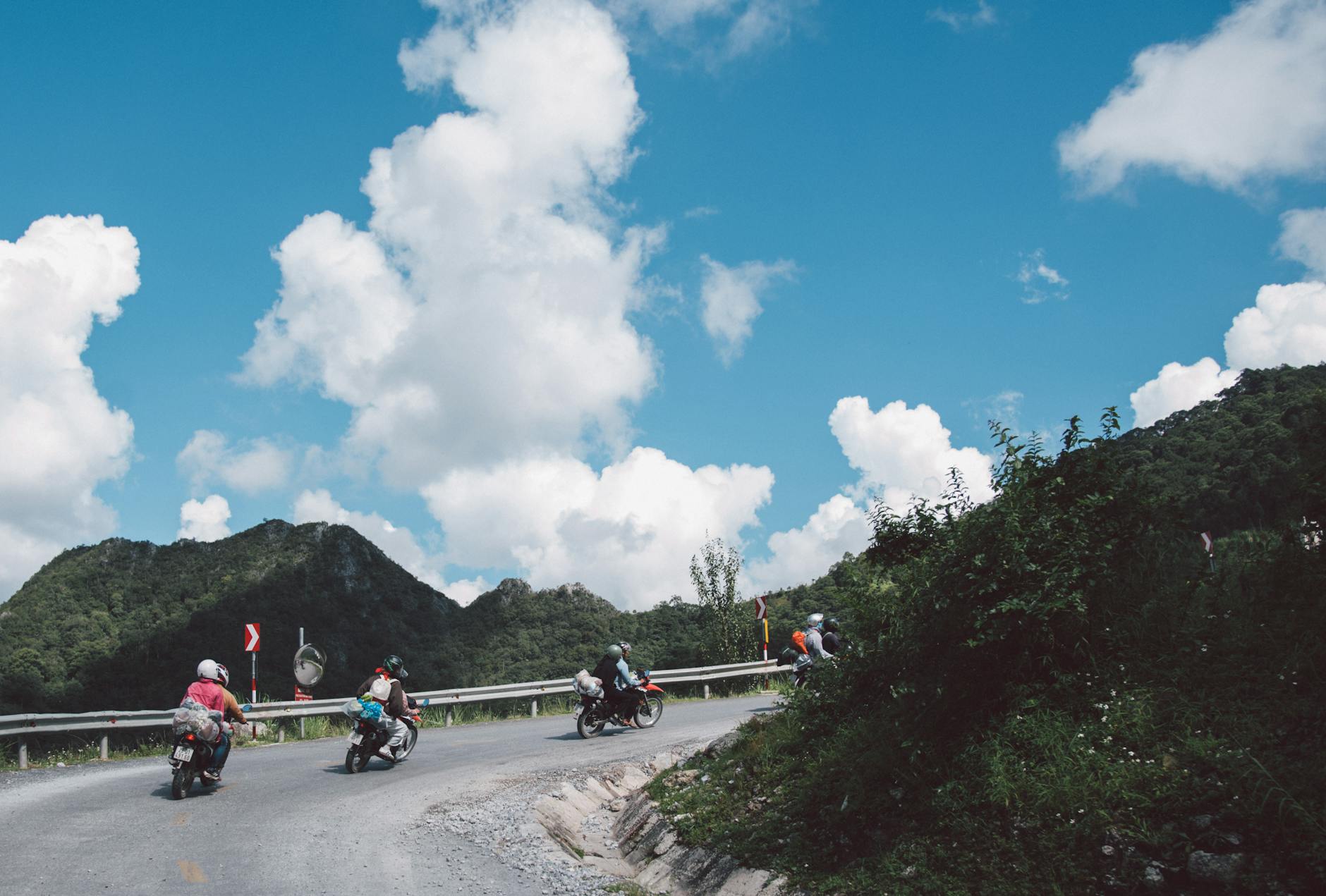 motorcyclists on a scenic mountain road