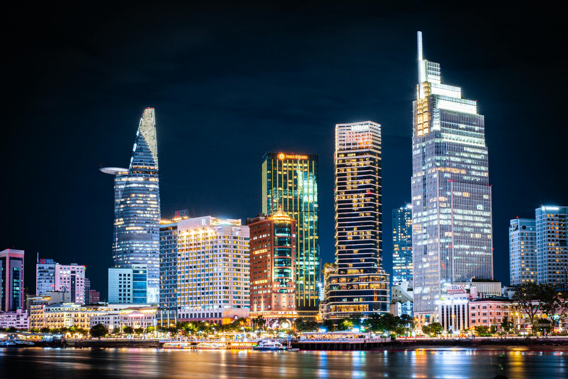 vibrant night skyline of ho chi minh city