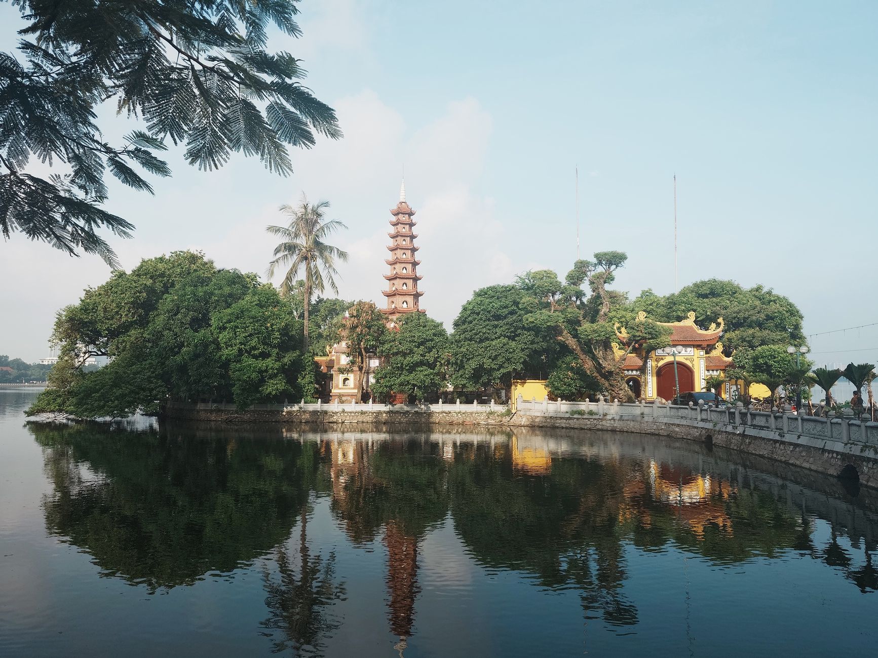 tran quoc pagoda reflected in west lake tranquility