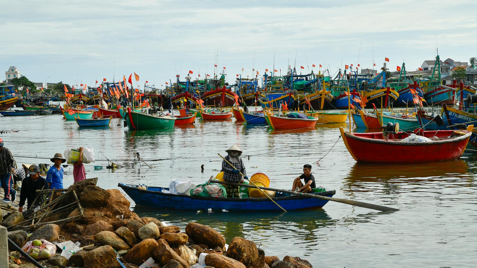 colorful fishing boats in phan thiet harbor