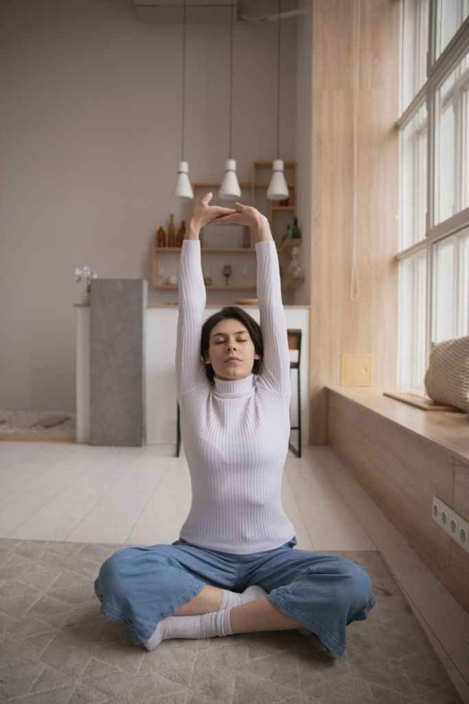 photo of woman stretching