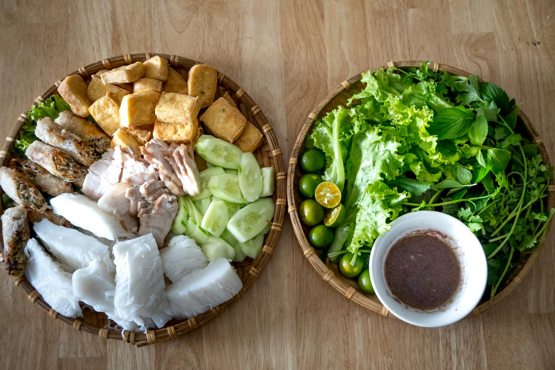 delicious vietnamese dish with fried tofu noodles and mixed leaves