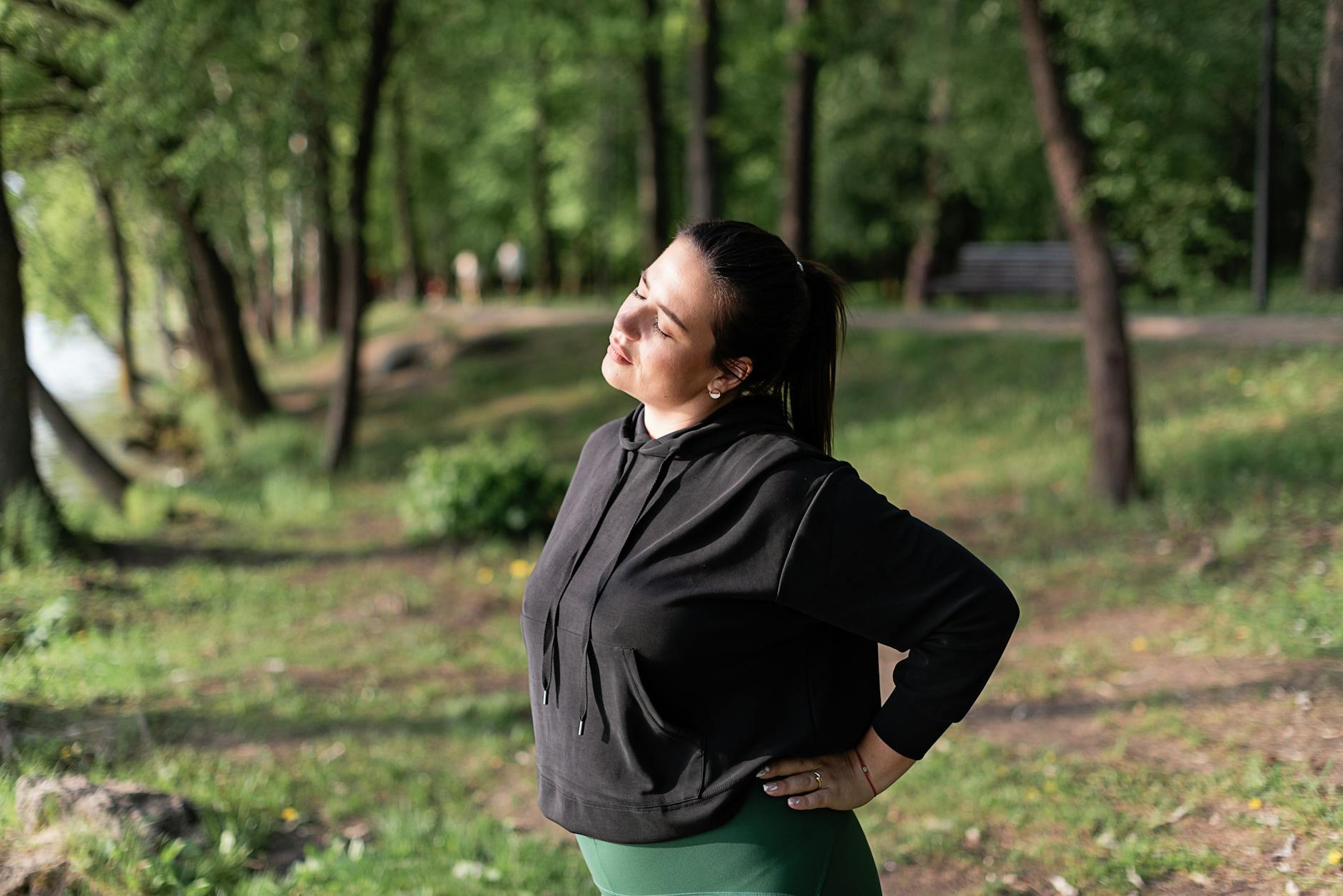woman stretching in the park